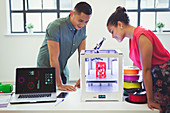 Designers watching 3D printer