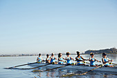 Female rowers rowing scull