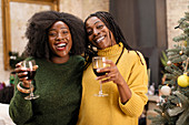 Mother and daughter drinking wine