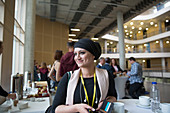 Smiling, businesswoman at conference