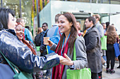 Women greeting at conference