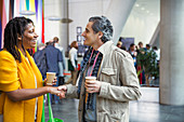 Businessman and businesswoman networking
