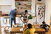 Grandparents and grandchildren baking