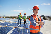 Portrait engineer at sunny solar power plant