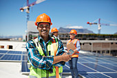 Portrait engineer installing solar panels