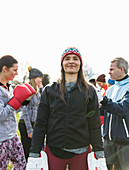 Portrait confident woman boxing in park