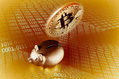 Golden Bitcoin over piggy bank