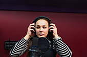 Teenage girl musician recording music