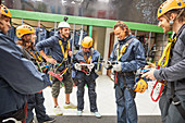 Zip line instructor and students