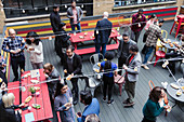 Friends socializing at party on patio