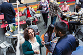 Friends socializing at party on patio