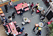 Overhead view friends socializing