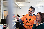 Hackers planning, coding for charity at hackathon