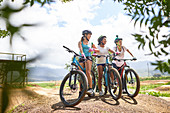 Women friends mountain biking