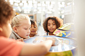 Curious kids at interactive exhibit