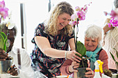 Senior woman in flower arranging class