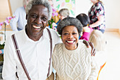 Portrait happy, enthusiastic senior couple