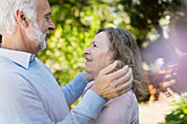 Affectionate senior couple hugging