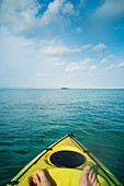 Personal perspective man kayaking on ocean