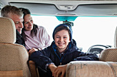 Portrait happy, carefree family in motor home