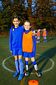 Portrait smiling, girl soccer players