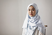 Portrait serious young woman wearing hijab