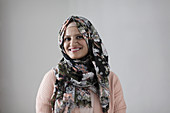 Portrait woman wearing floral hijab