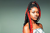 Portrait cool young woman with red braids
