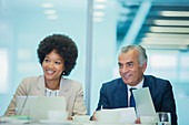 Smiling business people in meeting