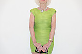Senior woman in green dress