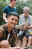 Portrait man with map, preparing for hike