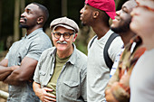 Portrait senior man with men's group