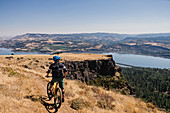 Man mountain biking, Oregon, USA