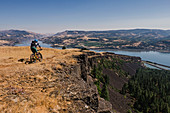 Man mountain biking, Oregon, USA