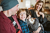 Happy family with guinea pig