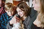 Affectionate family with guinea pig