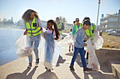 Volunteers cleaning up litter on boardwalk