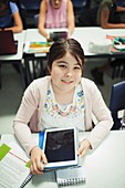 Portrait school student using tablet
