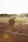 Determined paraplegic athlete in wheelchair race