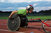 Determined paraplegic athlete in wheelchair race