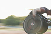 Determined paraplegic athlete in wheelchair race