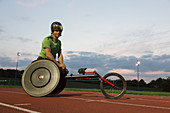 Portrait paraplegic athlete training for wheelchair race