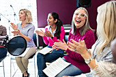 Happy women's choir singing