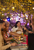 Friends toasting wine glasses