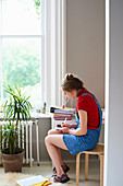 Young female college student studying