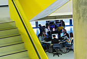 Junior high students working at computers in computer lab