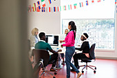 Instructor and students in computer lab