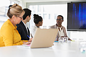 Business people talking in conference room meeting