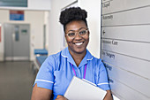 Portrait female nurse in hospital corridor