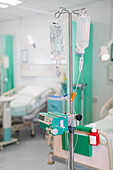 IV drip and medical equipment in hospital ward